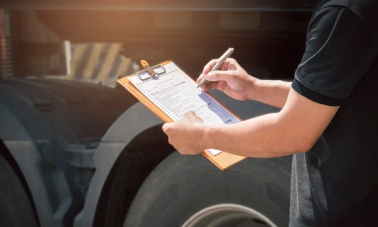 a person holding a clipboard and pen